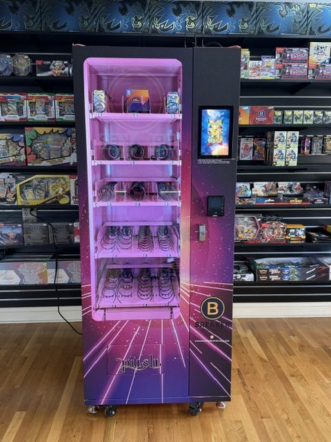 Front view of a purple LED trading card vending machine