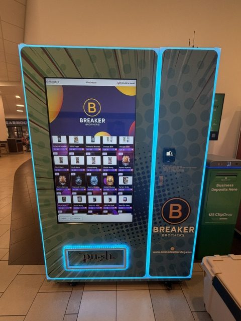 Front of a Breaker Brothers custom vending machine with a digital touchscreen